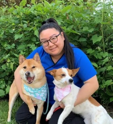 Linh with her two dogs